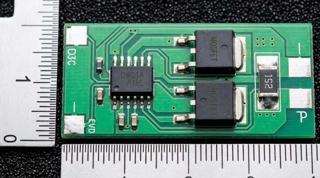 battery protection circuit PCB board showing DW01A protection IC dual MOSFET and current sense resistor