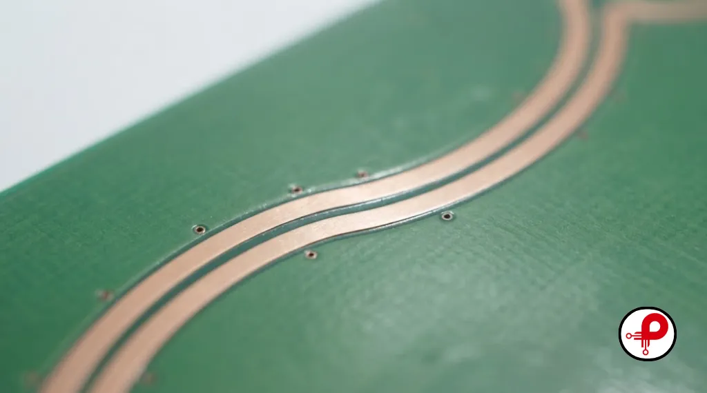  Differential pair routing with matched parallel copper traces on a PCB
