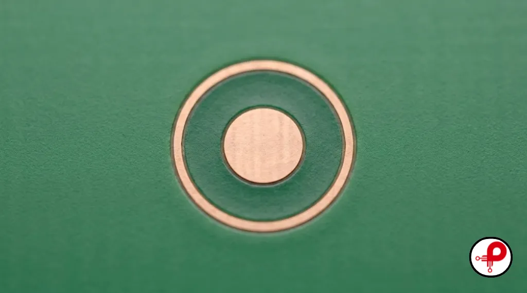 Circular copper fiducial pad with clear solder mask opening following PCB Fiducials Design guidelines